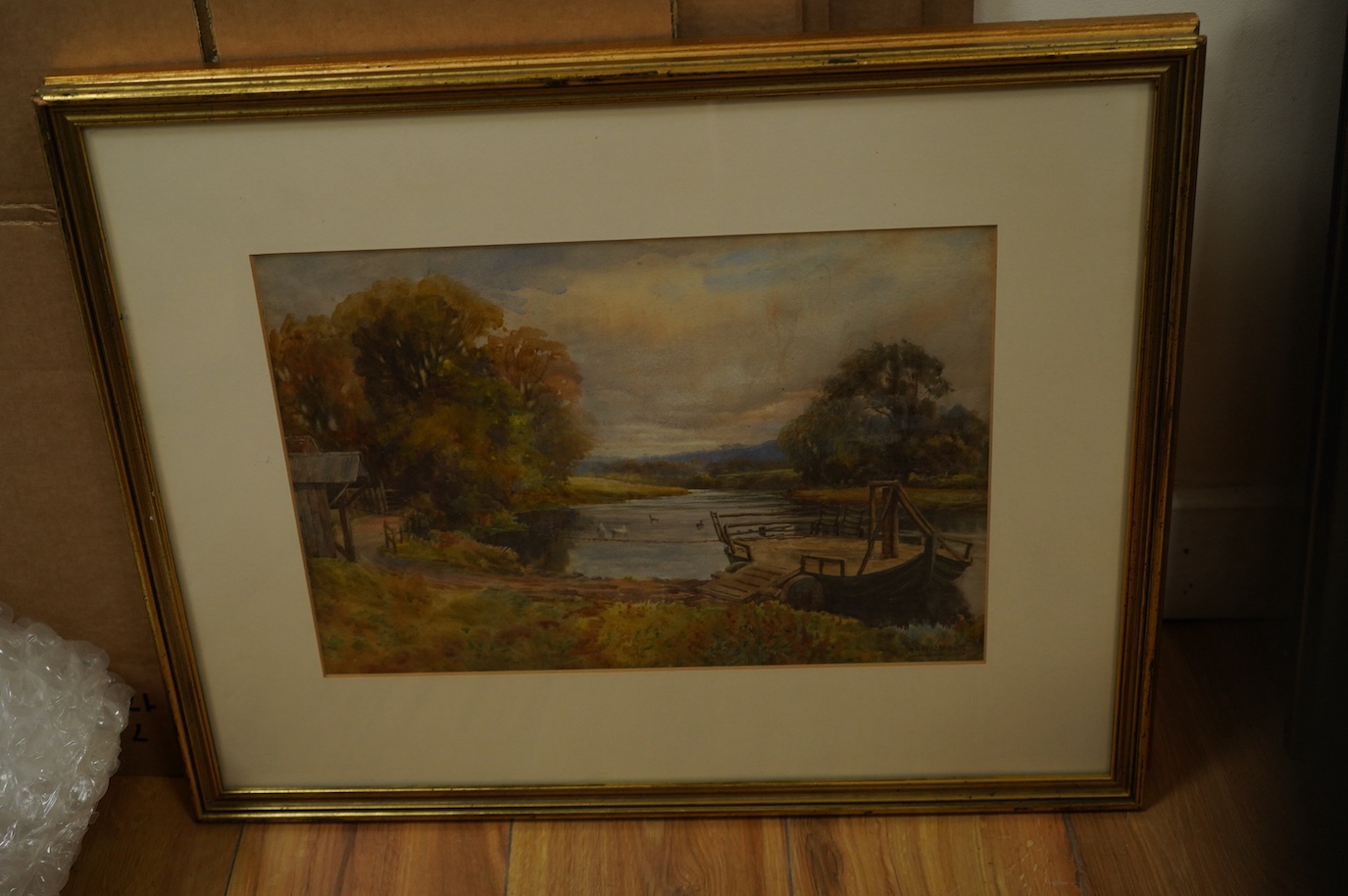 Four early 20th century and later watercolours, to include one by Sam Garratt, Riverscape and a French School watercolour, View of an archway, largest 38 x 25cm. Condition - fair